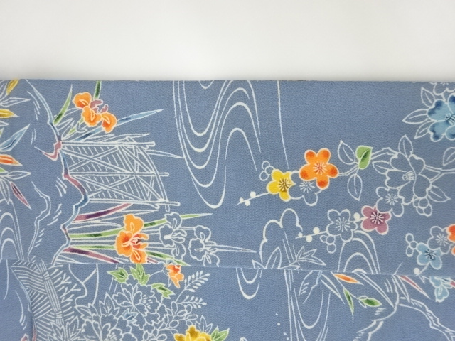  縮緬地柴垣に流水・草花模様名古屋帯